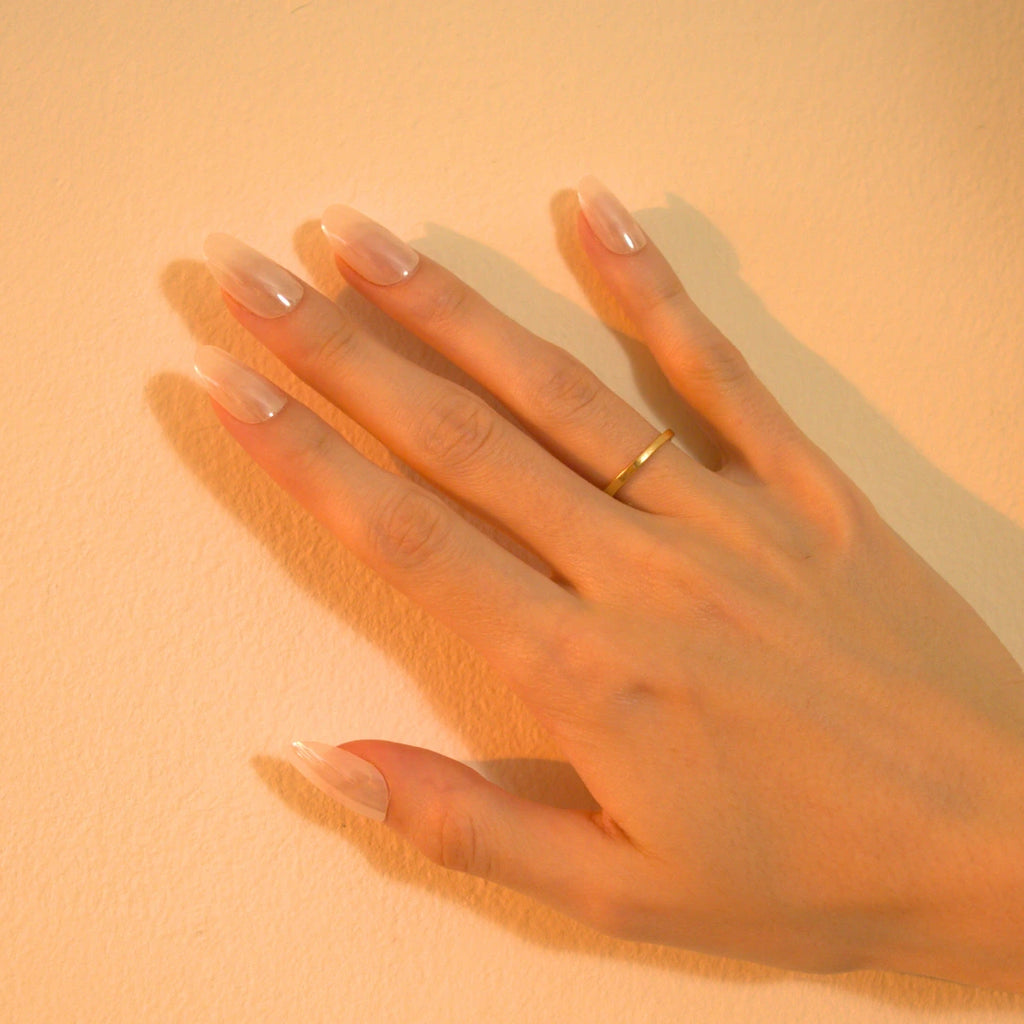 Soul Struck milky white press-on nails with a glossy sheer finish 3