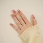 Pink glitter French tip press-on nails with a glossy salon-quality finish.