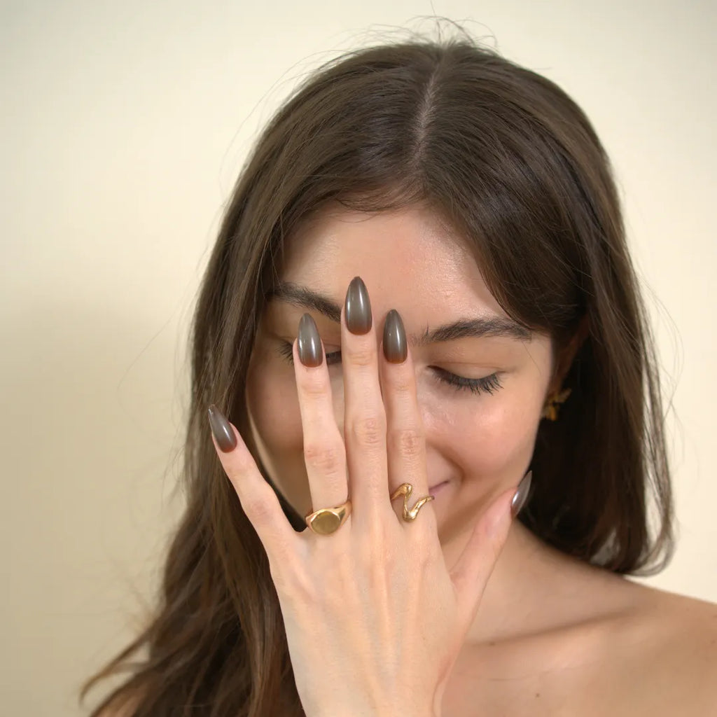 Long almond-shaped brown ombré press-on nails with a glossy gradient finish by Soul Struck