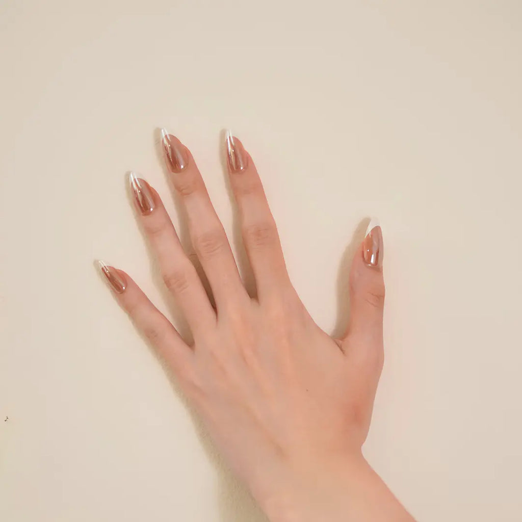glossy nude French tip almond-shaped press-on nails with a salon-quality finish