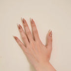 glossy nude French tip almond-shaped press-on nails with a salon-quality finish