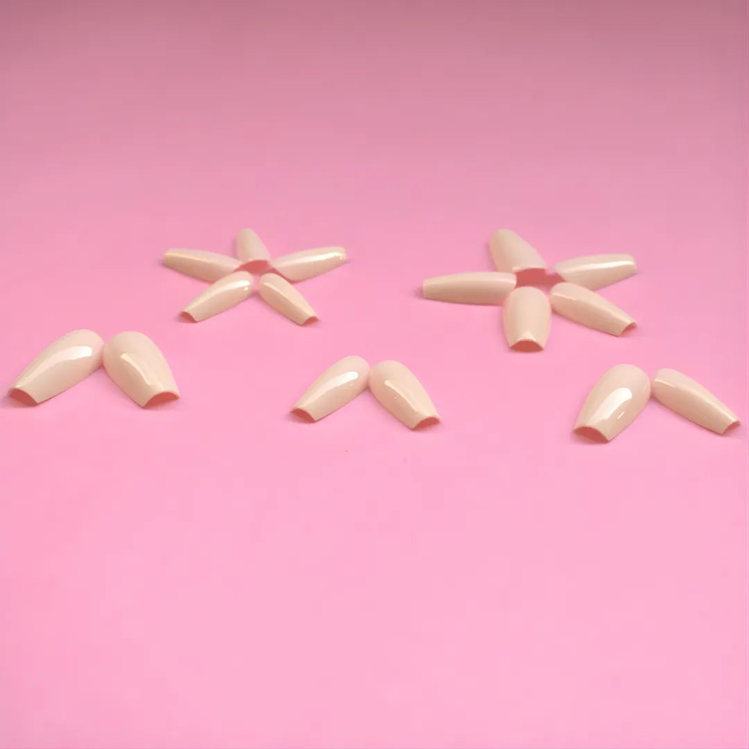 Glossy nude square press-on nails for a natural salon-quality manicure by Soul Struck.