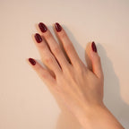 crimson shade short press-on nails with white polka dots by Soul Struck