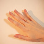 Short nude pink press-on nails with silver glitter French tips in a glossy salon-style manicure by Soul Struck