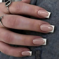 Nude pink and white French tip press-on nails with glossy finish, square-shaped reusable fake nails and easy stick-on nail extensions for women by Soul Struck