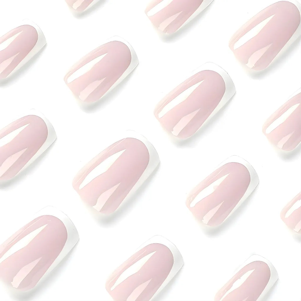 Nude pink and white French tip press-on nails with glossy finish, square-shaped reusable fake nails and easy stick-on nail extensions for women.