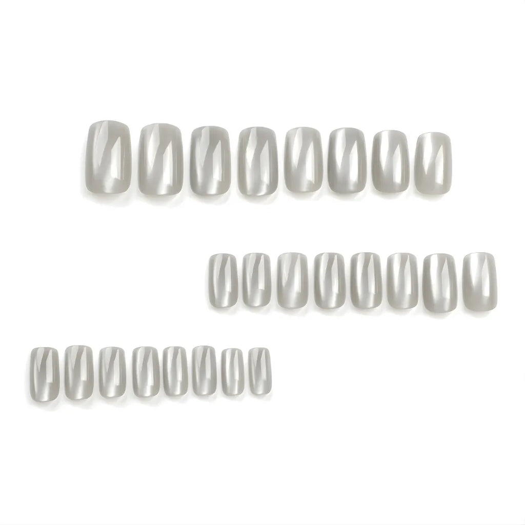 Silver chrome cat eye press-on nails in a short square shape, reusable glue-on nails with a metallic salon-quality finish.