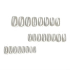 Silver chrome cat eye press-on nails in a short square shape, reusable glue-on nails with a metallic salon-quality finish.