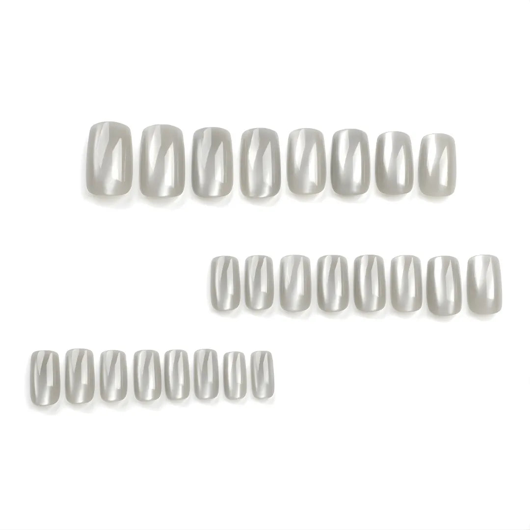 Silver chrome cat eye press-on nails in a short square shape, reusable glue-on nails with a metallic salon-quality finish.