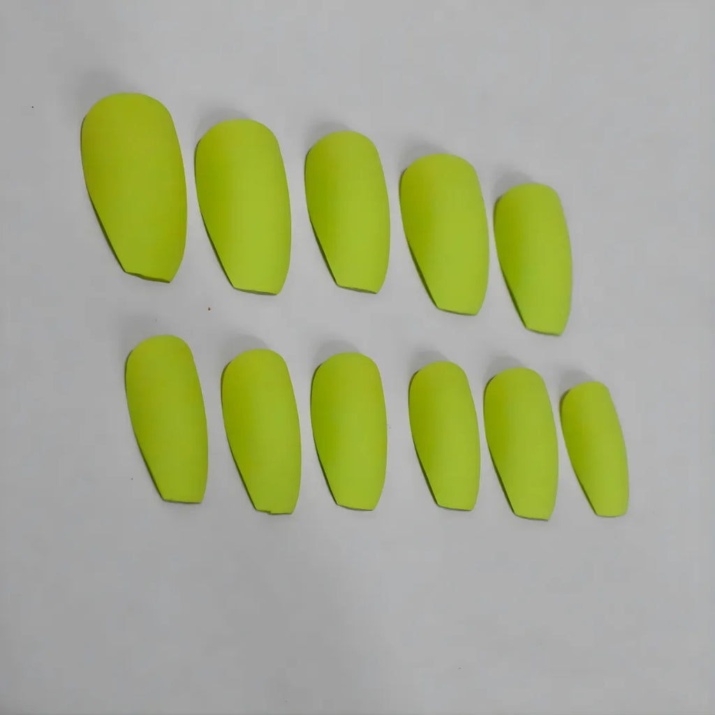 Solid matte kiwi green press-on nails in an square shape with a soft velvety finish.