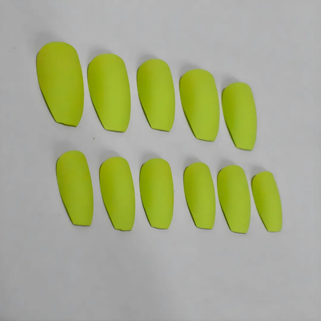 Solid matte kiwi green press-on nails in an square shape with a soft velvety finish.