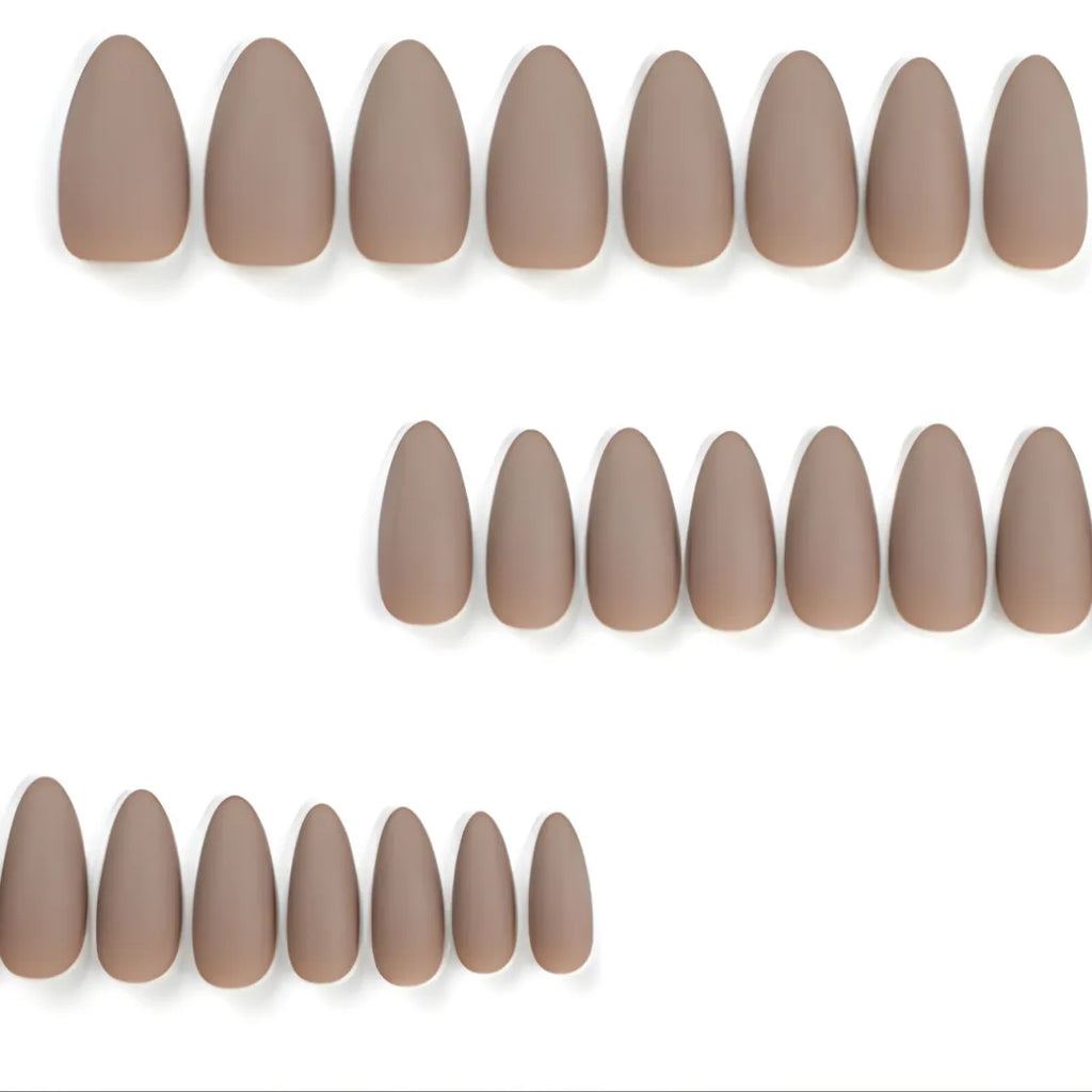 Matte taupe almond-shaped press-on nails with a smooth salon-quality finish by Soul Struck.