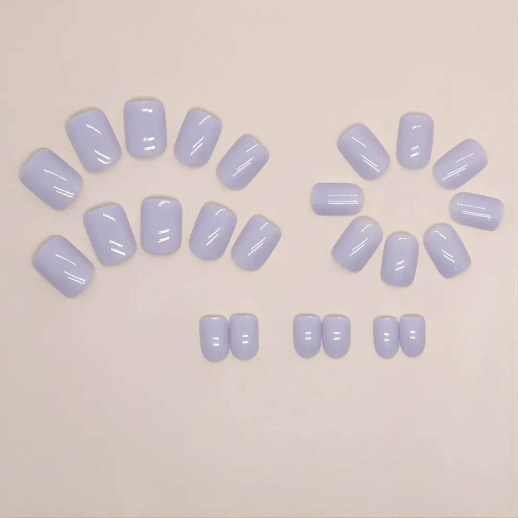 Soul Struck short pastel lavender press-on nails featuring a glossy solid color design and reusable salon-style finish.