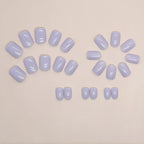 Soul Struck short pastel lavender press-on nails featuring a glossy solid color design and reusable salon-style finish.