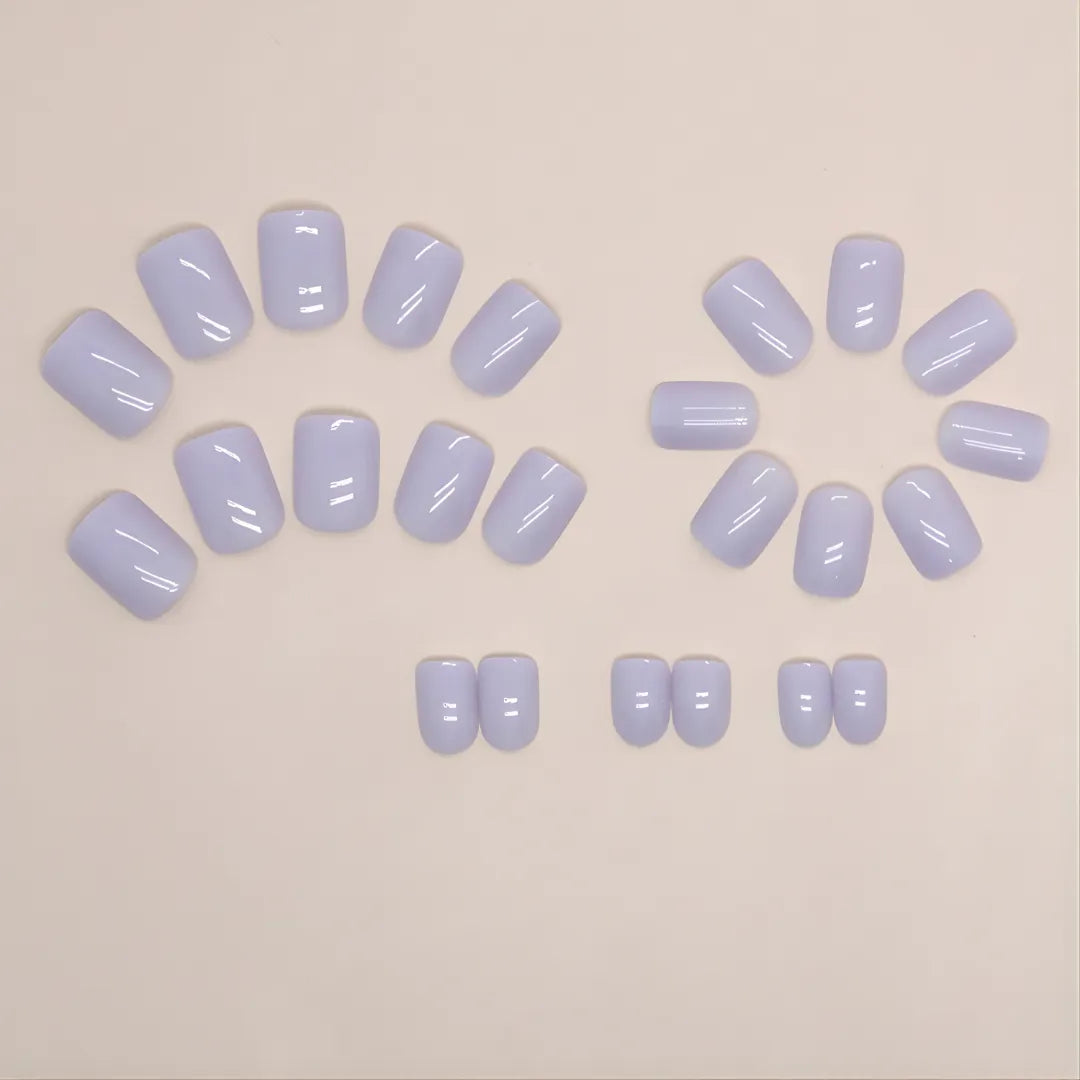 Soul Struck short pastel lavender press-on nails featuring a glossy solid color design and reusable salon-style finish.