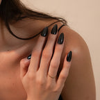 "Soul Struck Premium matte black cat eye press-on nails in a long almond shape with a metallic shimmer finish for a bold, salon-quality look."