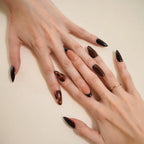 Luxury brown and black almond-shaped press-on nails featuring glossy solid shades, tortoiseshell nail art, and nude accents for a chic salon-quality manicure by Soul Struck