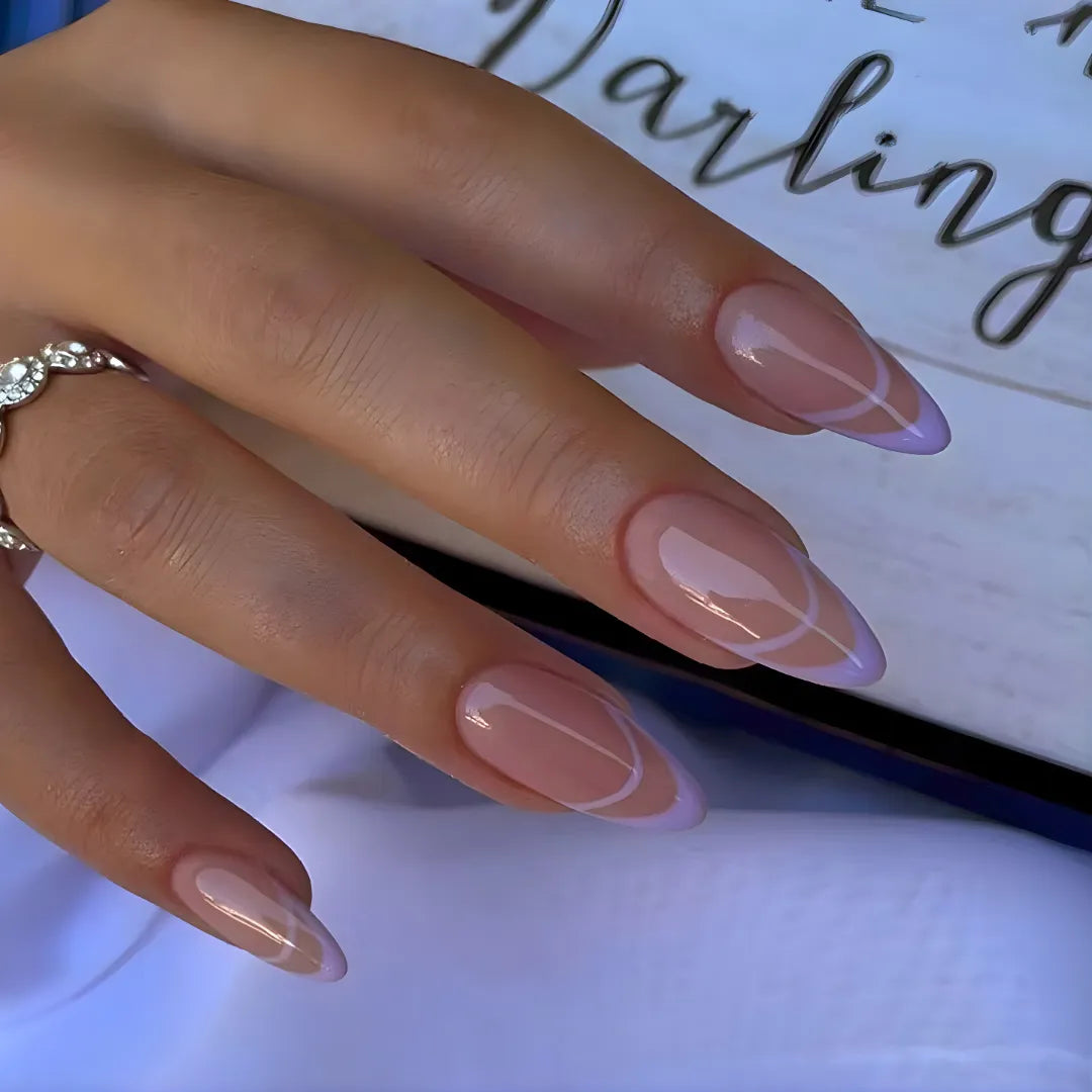 Lavender almond-shaped press-on nails with glossy finish and subtle curved detailing, reusable fake nails and easy stick-on nail extensions for women.