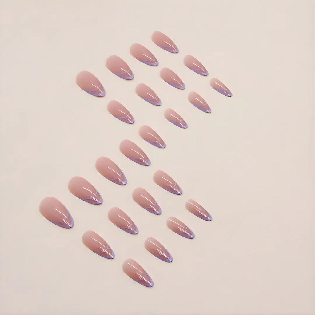 Lavender almond-shaped press-on nails with glossy finish and subtle curved detailing, reusable fake nails and easy stick-on nail extensions for women by Soul Struck
